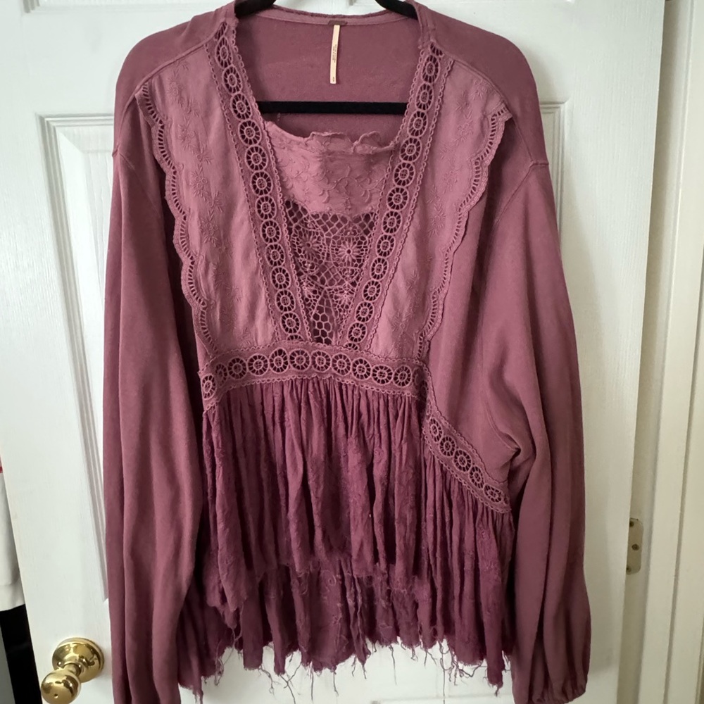 Free people distressed hem top